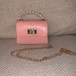 Mini pink purse with crossbody chain